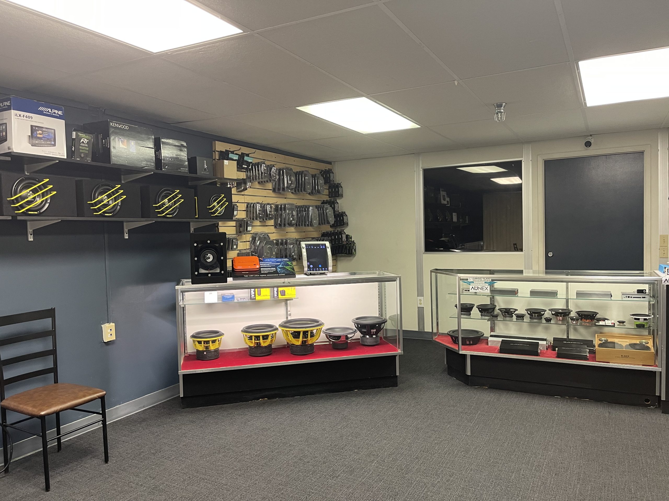 An organized display of electronics and assorted items in a room, representing the extensive inventory of the Puresounds store.